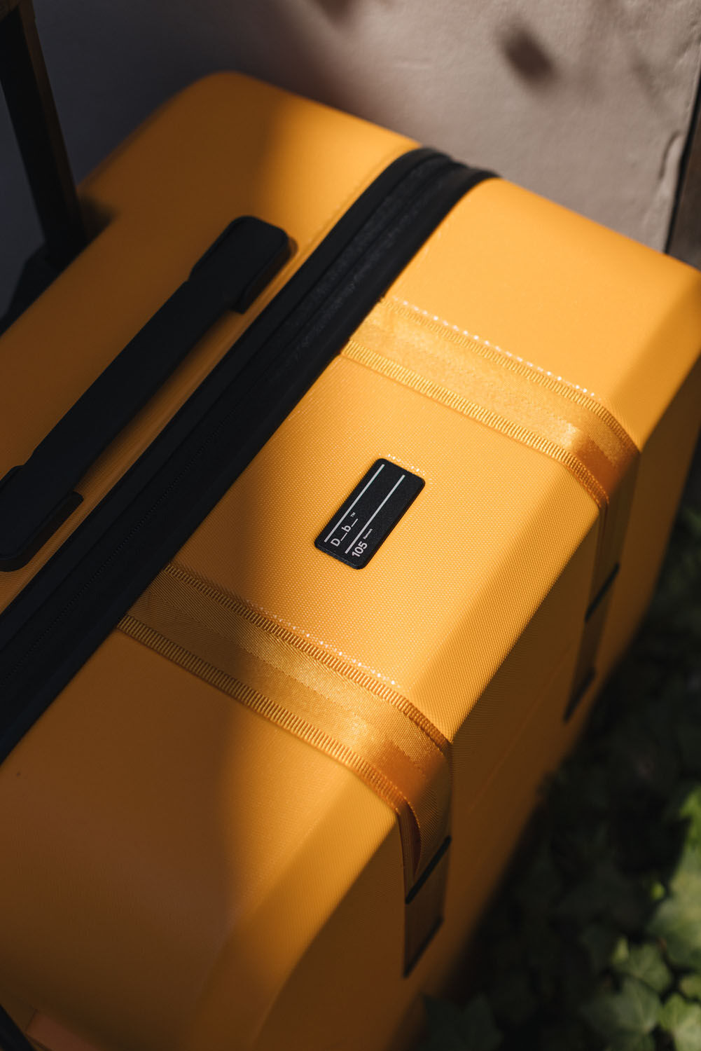 D_b_ Ramverk Check-in Luggage Large Parhelion Orange