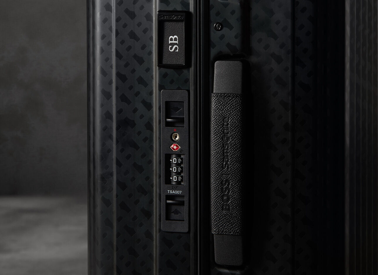 Samsonite BOSS Trolley mit 4 Rollen 55cm Graphite Monogram Samsonite BOSS Trolley mit 4 Rollen 55cm Graphite Monogram